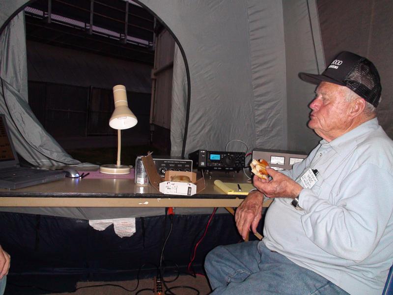 DSC01776.JPG - Midnight break at the cw station.  Dan Colburn W6DC