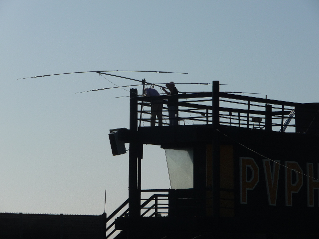 P1000631.jpg - Last minute adjustments to tri-band antenna