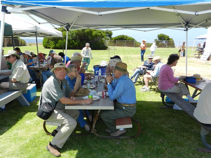 DSCN9763c.jpg - Brian Tilley KA6UHM and others enjoying the great food.