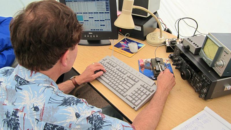 050.JPG - Rocco, N6KN, does four CW QSO's per minute in final dash before Field Day ends.