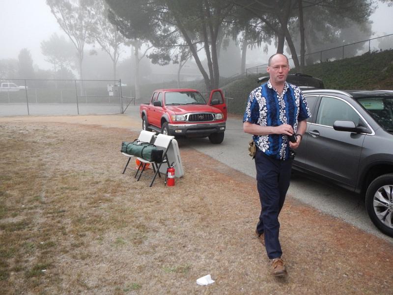 022a.jpg - Chris, KA6WNK, prepares to set up the GOTA station.