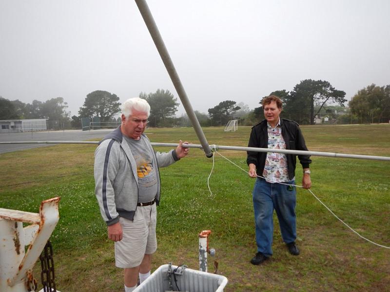 037a.jpg - Walt, K1DFO, and Rocco, N6KN, get ready to lift the Mosley Yagi antenna.