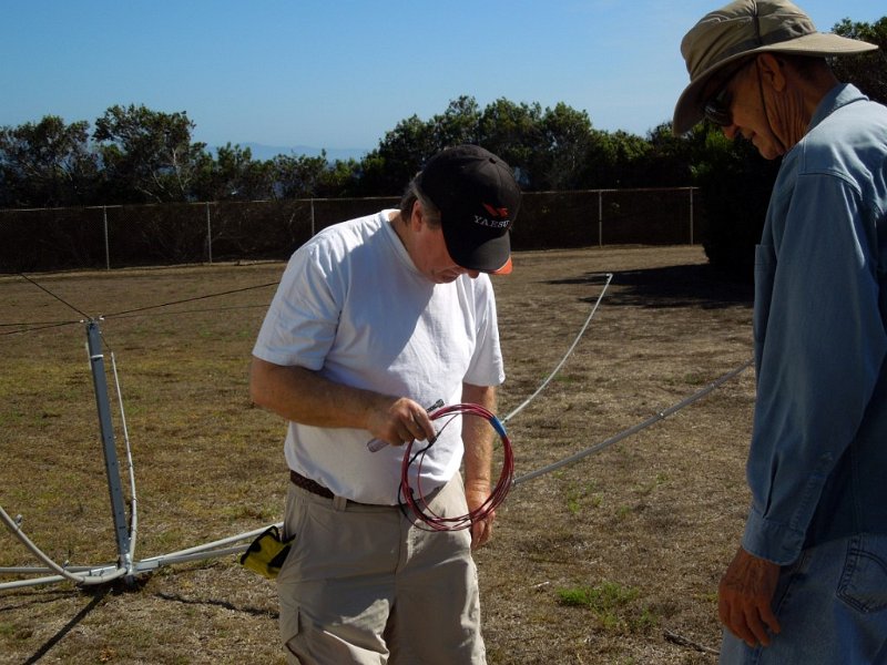 013a.jpg - Clay, AB9A, and Bob, W6HIP, figure which wire goes on the hexbeam spreaders