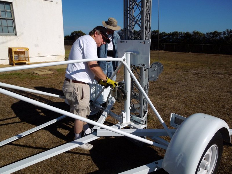 022a.jpg - Securing the tower in a full upright position.